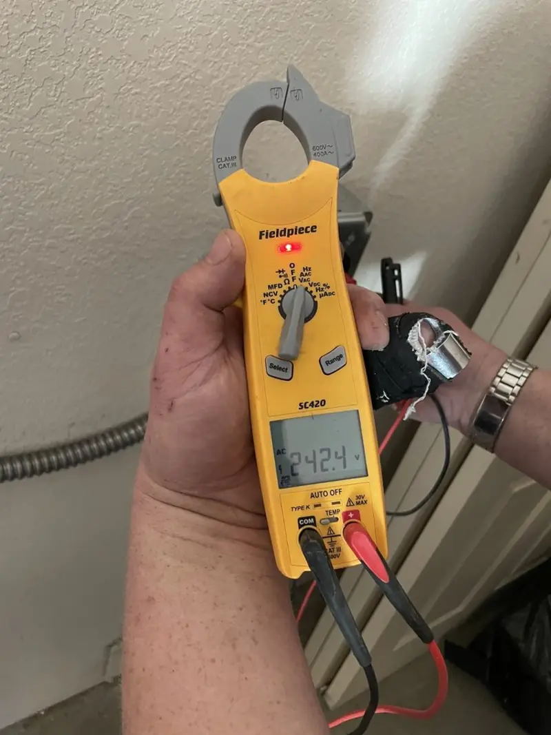Voltage testing with clamp meter during Circuit Breaker Repair in Lincoln